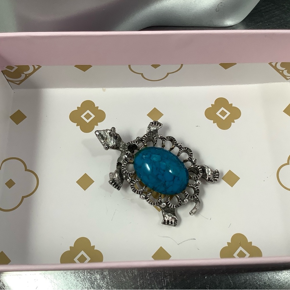 Gerry’s signed turtle pin